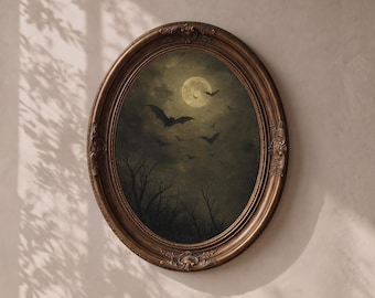 Puede incluir: Una pieza de arte mural ovalada que muestra una escena oscura y sombría de murciélagos volando frente a una luna llena en un cielo nocturno nublado sobre siluetas de ramas de árboles desnudas, en un marco decorativo de color bronce antiguo.