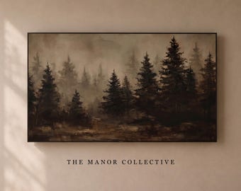 May include: A rectangular landscape wall art piece featuring a dark, moody forest scene with silhouettes of pine trees set against a foggy, sepia-toned background. The text THE MANOR COLLECTIVE is printed in black capital letters below the frame.
