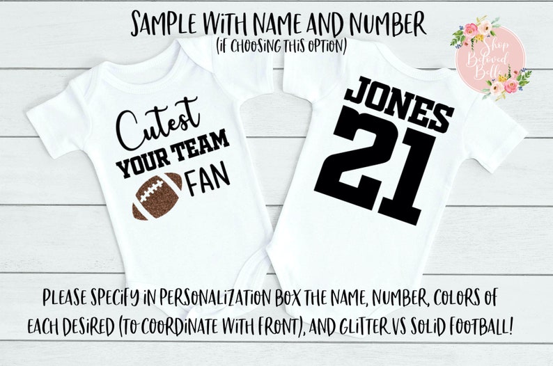 May include: Two white baby onesies. One has the text "Cutest YOUR TEAM FAN" with a brown football graphic. The other has "JONES 21" in black. The text "SAMPLE WITH NAME AND NUMBER" is at the top.