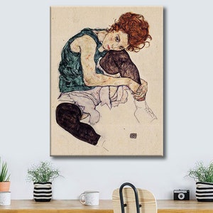 Canvas print of "Seated Woman with Bent Knee" 1917 by Egon Schiele. Ready-to-hang art for bedroom or living room wall. Better than a poster!