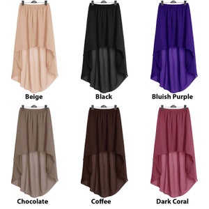 Pu&ograve; includere: Sei gonne asimmetriche di diversi colori: beige, nero, viola bluastro, cioccolato, caff&egrave; e corallo scuro. Le gonne sono realizzate in un tessuto trasparente e hanno un'alta vita.