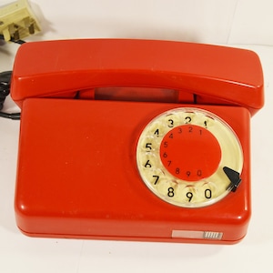 Vintage rotary phone Old red phone Retro dial telephone 1980s