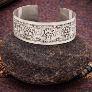 Tibetan Silver Cuff Bracelet with Eight Auspicious Symbols – Handmade Nepalese Ethnic Boho Bangle