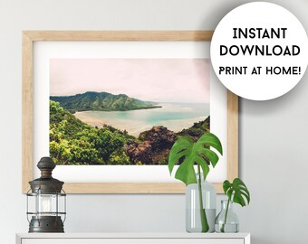 May include: A white three-drawer dresser with silver handles and wooden legs. A framed landscape print hangs above the dresser. A decorative lantern and glass vases with green leaves sit on top of the dresser. The print has a coastal scene. Text on the image says "INSTANT DOWNLOAD PRINT AT HOME!"