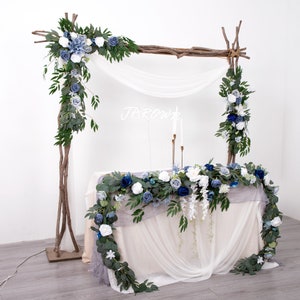 Greenery & Blue Rose Floral Arrangement: Wedding Arch Decor