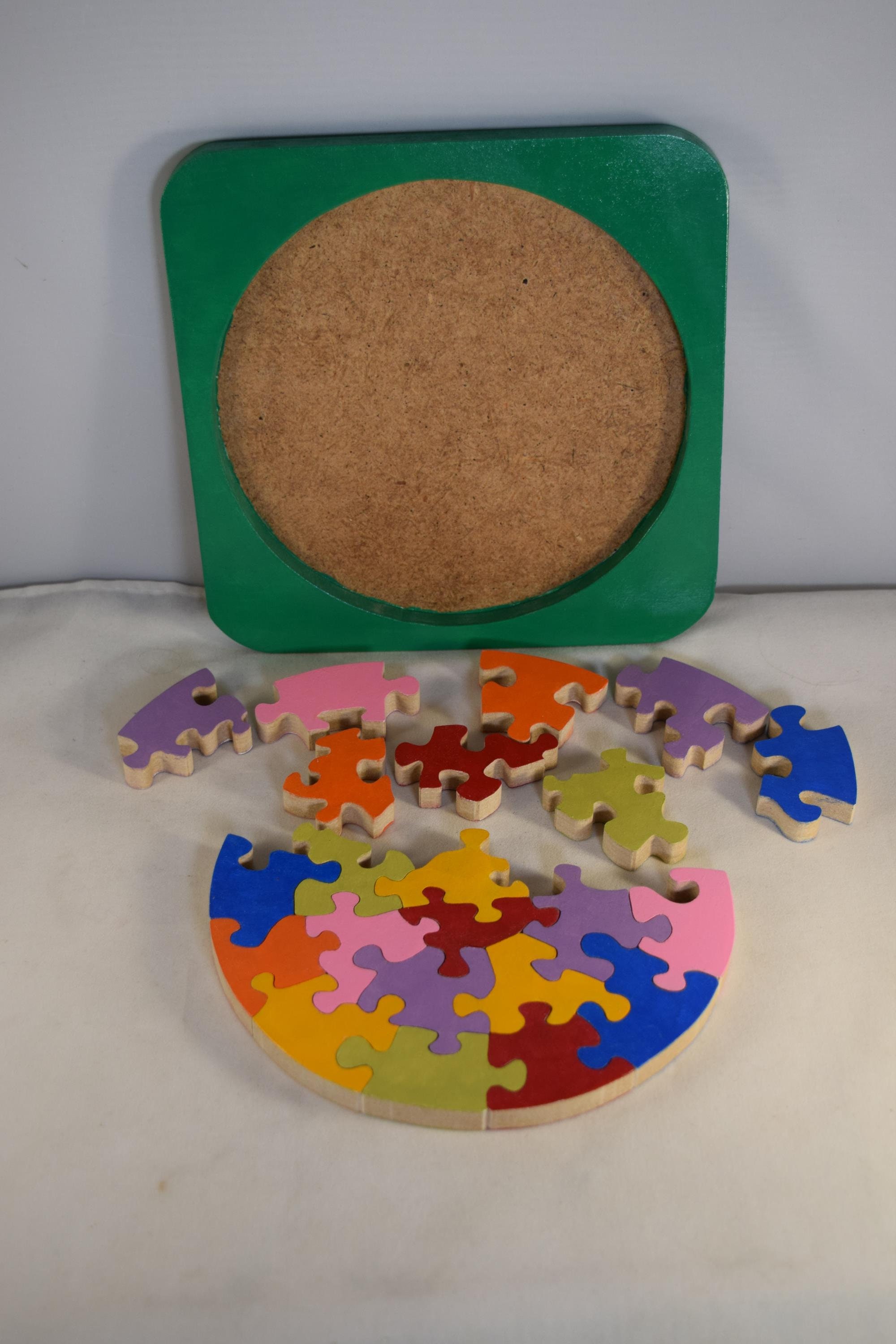Brightly Coloured Circular Puzzle in a Frame, Suitable for Adults and Children, Stimulating