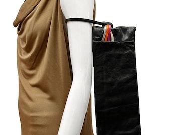 Gestreepte leren clutch met accent