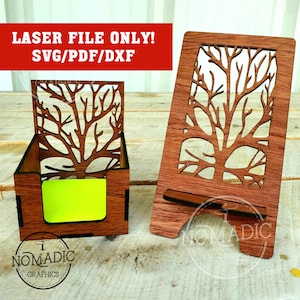 May include: Two wooden desk organizers with a tree branch design. One is a phone stand, the other a box for notes. The text "LASER FILE ONLY! SVG/PDF/DXF" is in a red banner. The logo for "NOMADIC GRAPHICS" is at the bottom.