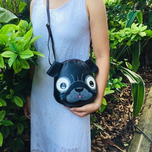 Black pug crossbody bag,hand painted bag,this compact synthetic leather sling bag, for carrying mobile phones and other essentials. image 5