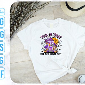 May include: White t-shirt with a purple and orange cartoon house with the text "Trick or Treat. Need more square feet?" printed on the front.