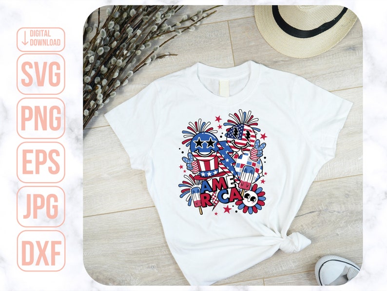 May include: White t-shirt with a red, white, and blue graphic design featuring cartoon characters, fireworks, and the word "America".