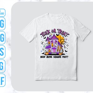 May include: White t-shirt with a purple and pink cartoon haunted house with the text "Trick or Treat. Need more square feet?"