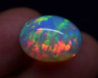 Exclusive Fire Natural Ethiopian Opal Oval Shape 8.90 Carat Ethiopian Opal Cabochon Gemstone Size 16.4X11.7X10.1 mm