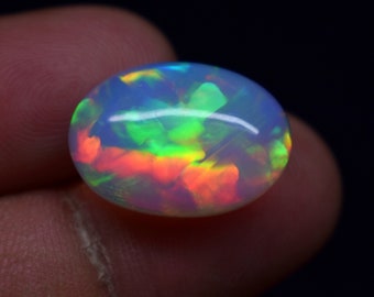 AAA+ Quality 8.60 Carat Galaxy Fire Natural Ethiopian Opal Oval Shape Cabochon Gemstone, Size 18.9X13.3X7.4 MM, For Making Jewelry.