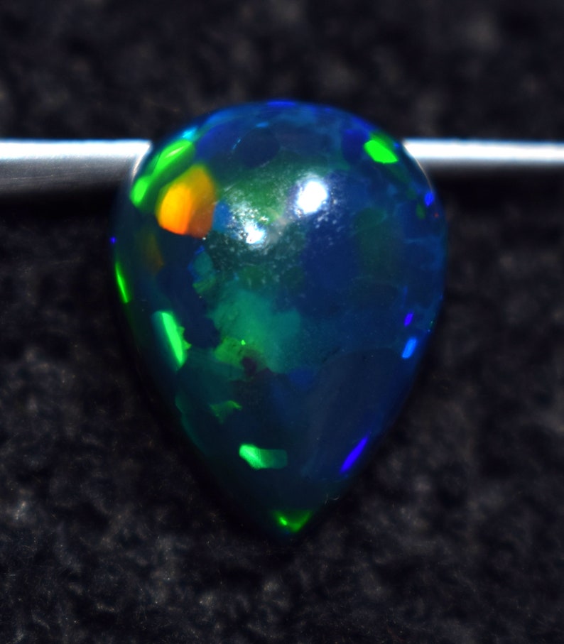 Beautiful Ethiopian Galaxy Fire Opal 5.50 Carat Natural Opal 16X12.3X6.3 MM Multi Fire Opal. Black Ethiopian Opal Gemstone