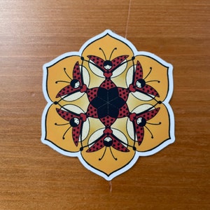 Adesivo in vinile fiore coccinella