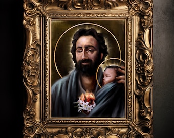 May include: A framed religious painting featuring a man with a beard holding a baby. The painting has a gold frame with ornate detailing. The man has a gold halo, and the baby is wrapped in a blue cloth. A cluster of white flowers is at the bottom.