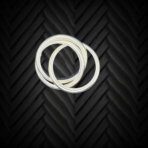 Tiffany & Co.  Triple Rolling Silver Interlocking Ring