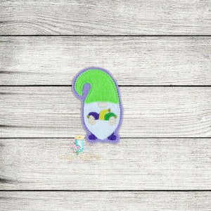 May include: A purple and green felt gnome holding a basket of purple, green and yellow Mardi Gras beads.