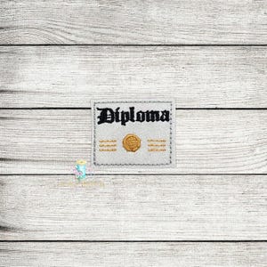 May include: A white embroidered patch with the word "Diploma" in black lettering and a gold seal. The patch has a white background and gold trim.
