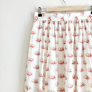 Saia midi de algodão com estampa de leque, saia midi estampada, saia midi larga, saia completa, saia 1950, saia de algodão branco, saia com bolsos