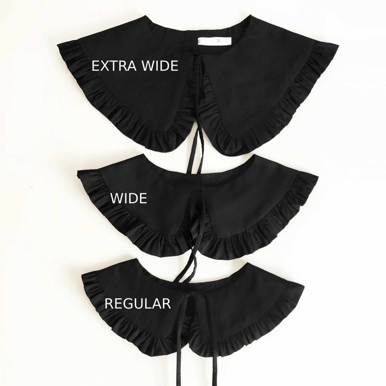 May include: Three black fabric collars with ruffled edges. The collars are labeled "Extra Wide", "Wide", and "Regular".