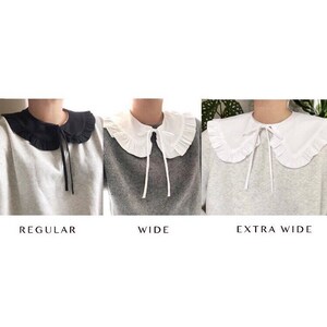 May include: Three white collared shirts with different collar widths. The collars are ruffled and have a tie at the neck. The collars are labeled "Regular", "Wide", and "Extra Wide".