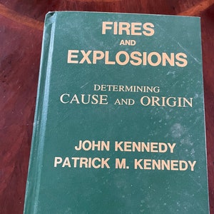 May include: A green book titled "Fires and Explosions: Determining Cause and Origin" by John Kennedy and Patrick M. Kennedy. The book is published by Investigations Institute.