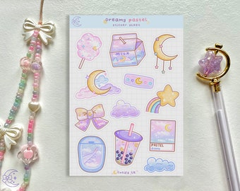 May include: A sheet of pastel-themed stickers featuring a cotton candy, milk carton, crescent moons, clouds, a rainbow, a star, a bow, a boba drink, and an airplane window. The text "Dreamy pastel" and "Cutify UK" are visible.