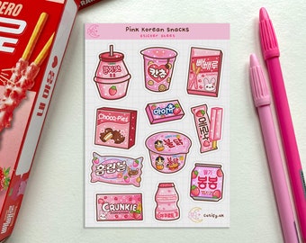 May include: A sticker sheet featuring pink and white illustrations of popular Korean snacks, including Choco-Pies, Pepero, and yogurt. The sheet is labeled "Pink Korean Snacks" and "sticker sheet".