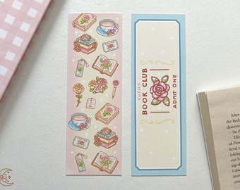May include: Two bookmarks with a pink and yellow color scheme. The bookmark on the left features a variety of illustrations including teacups, books, roses, and a pen. The bookmark on the right is a ticket with the text "GUTIFY BOOK CLUB ADMIT ONE".