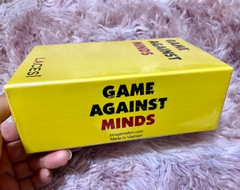 May include: Yellow box with the text "GAME AGAINST MINDS" in black and red letters. The box also includes the text "boxgamefun.com Made in Vietnam".