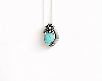 Amaroo turquoise and sterling pendant with floral and branch accent