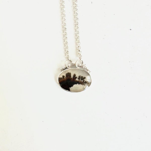 Scenic dendritic agate oval pendant in sterling silver with cast branch detail