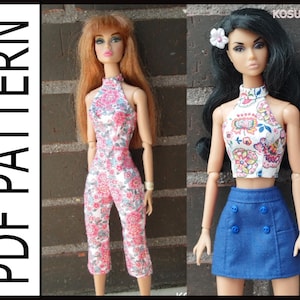 May include: Two dolls wearing floral print outfits. The doll on the left is wearing a floral jumpsuit. The doll on the right is wearing a floral crop top and a blue denim skirt with buttons.