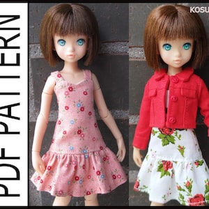 May include: Two dolls wearing handmade outfits. One doll is in a pink floral dress, and the other is in a red jacket and floral skirt. The image includes the text "PDF PATTERN" and the brand name "KOSUCAS".
