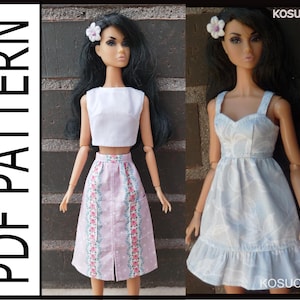 May include: Two fashion doll outfits. One doll wears a white crop top and a pink skirt with floral accents. The other doll is in a light blue dress with a leaf pattern and ruffled hem. The image includes the text "PDF PATTERN" and the brand name "KOSUCAS".