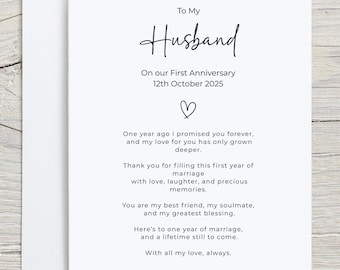 May include: A white anniversary card with the words "To My Husband" in elegant script. The card includes a heartfelt message about love and marriage, with the date "12th October 2025" and the signature "Milax".