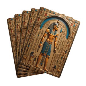 May include: A stack of playing cards with an Egyptian theme. The cards feature a relief of an Egyptian pharaoh in gold, blue, and tan. The cards are rectangular with hieroglyphs and other Egyptian imagery.