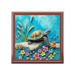 May include: A framed painting of a sea turtle on a rock surrounded by colourful flowers. The turtle is swimming in a blue ocean with a white and blue marbled pattern.