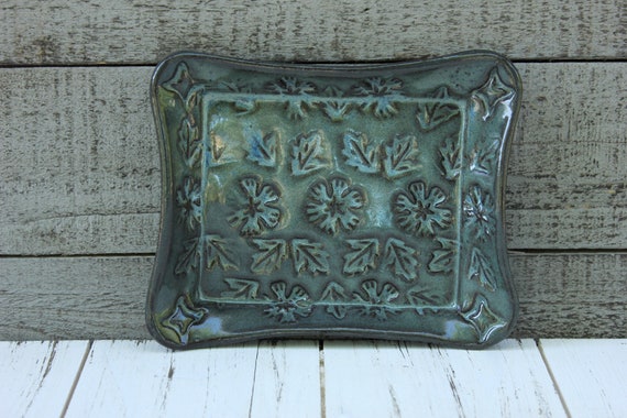 Dark Blue Dish with Stamped Floral Motif