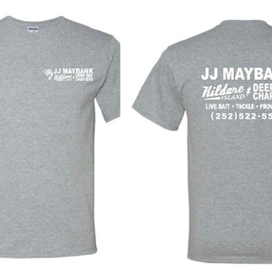 May include: A heather gray short-sleeve t-shirt featuring a small white logo on the front left chest and a large white graphic on the back that reads JJ MAYBANK Kildare ISLAND DEEP SEA CHARTERS LIVE BAIT TACKLE PROVISIONS (252)522-5502.