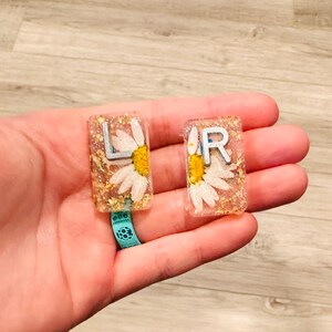 Gold and White Flower X-ray markers