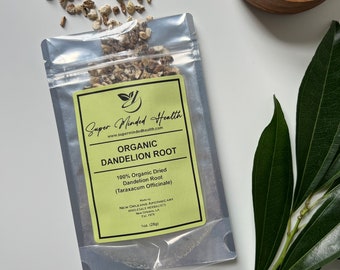 May include: A silver pouch with a yellow label that reads "Super Minded Health" and "Organic Dandelion Root". The label also includes the text "100% Organic Dried Dandelion Root (Taraxacum Officinale)" and "1oz. (28g)".