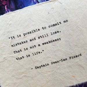 May include: A black and white image of a quote by Captain Jean-Luo Picard, "It is possible to commit no mistakes and still lose. That is not a weakness; that is life."