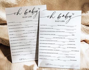 Pode incluir: Dois cartões de jogo Mad Libs imprimíveis em preto e branco com o texto "Oh Baby" e um símbolo de coração. Os cartões são para um chá de bebê e têm perguntas para completar com espaços em branco sobre o novo bebê.