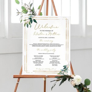 May include: A wedding ceremony program sign with a gold frame and green foliage. The sign includes the names Kristine and Matthew, the date August 25, 2018, and the location California. The sign also includes the wedding party names and roles.