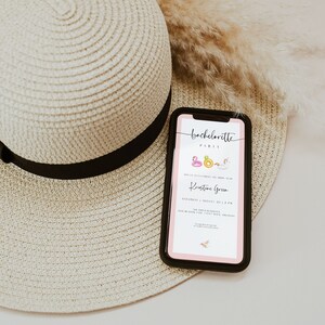 May include: A smartphone displaying a bachelorette party invitation with a pink background and colorful illustrations of inflatable pool floats. The text on the invitation reads "Bachelorette Party" and "Kristine Green".