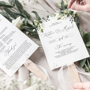 May include: Wedding ceremony program fans with a green and white floral design. The fans feature the names "Kristine & Michael" and the date "August 24, 2019".