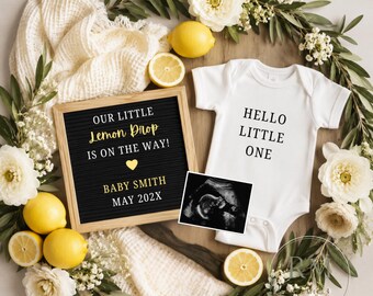 May include: A white baby bodysuit with the text HELLO LITTLE ONE, a black letter board reading OUR LITTLE Lemon Drop IS ON THE WAY! BABY SMITH MAY 202X, a baby ultrasound scan, yellow lemons, and white flowers arranged in a circular wreath pattern.